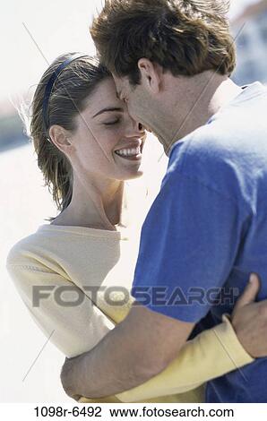 people, couple, outdoors, hugging, hug, closeness View Large Photo Image Stock Image - people, couple, outdoors, hugging, hug, closeness. Fotosearch