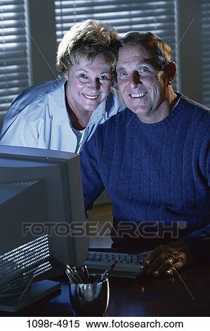 people, couple, senior, computer, using, posing, indoors View Large Photo Image Stock Photography - people, couple, senior, computer, using, posing, indoors. Fotosearch
