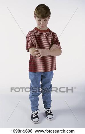 people, crying, boy, child, sad, jeans, T-shirt View Large Photo Image Stock Photograph - people, crying, boy, child, sad, jeans, T-shirt. Fotosearch