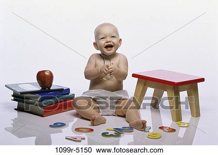 people, diaper, table, books, apple, baby, future View Large Photo Image Stock Image - people, diaper, table, books, apple, baby, future. Fotosearch