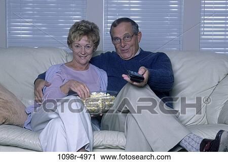people, eating, couple, senior, popcorn, watch, watching View Large Photo Image Stock Image - people, eating, couple, senior, popcorn, watch, watching. Fotosearch