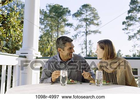 people, eating, water, couple, Hispanic, outdoors, Middle-aged View Large Photo Image Stock Photo - people, eating, water, couple, Hispanic, outdoors, Middle-aged. Fotosearch