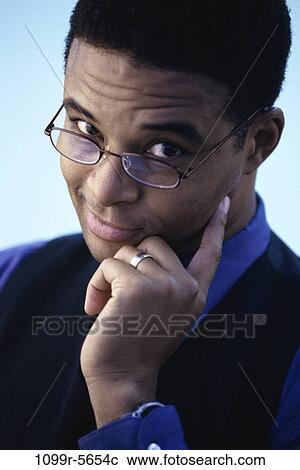 people, eyeglasses, skeptical, business, Middle-aged, businessman View Large Photo Image Stock Image - people, eyeglasses, skeptical, business, Middle-aged, businessman. Fotosearch