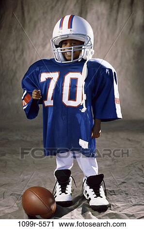 people, football, boy, uniform, indoors, player, sport View Large Photo Image Stock Image - people, football, boy, uniform, indoors, player, sport. Fotosearch