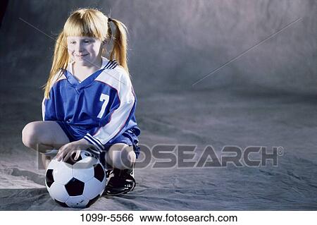 people, girl, child, uniform, indoors, soccer, soccer ball View Large Photo Image Stock Photograph - people, girl, child, uniform, indoors, soccer, soccer ball. Fotosearch