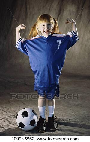 people, girl, strength, arms, uniform, indoors, soccer View Large Photo Image Stock Image - people, girl, strength, arms, uniform, indoors, soccer. Fotosearch