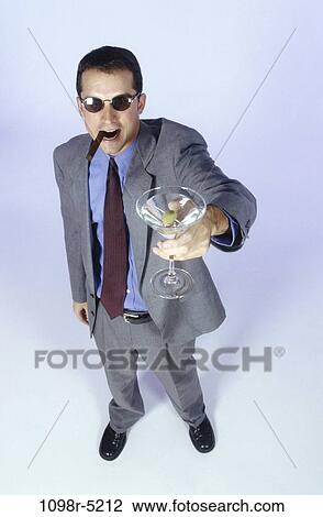 people, glass, cigar, suit, drinking, sunglasses View Large Photo Image Stock Image - people, glass, cigar, suit, drinking, sunglasses. Fotosearch