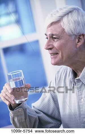 people, glass, water, home, senior, drinking View Large Photo Image Picture - people, glass, water, home, senior, drinking. Fotosearch