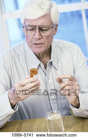 people, glass, water, senior, bottle, reading View Large Photo Image Stock Image - people, glass, water, senior, bottle, reading. Fotosearch