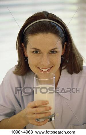people, glass, woman, smiling, healthy, milk, drinking View Large Photo Image Stock Photo - people, glass, woman, smiling, healthy, milk, drinking. Fotosearch