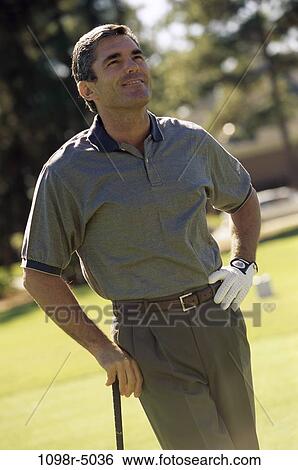 people, golf, Hispanic, outdoors, Middle-aged, brunette View Large Photo Image Stock Photograph - people, golf, Hispanic, outdoors, Middle-aged, brunette. Fotosearch