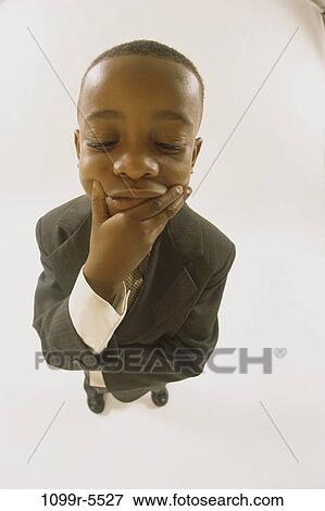 Stock Photo - people, hand, suit, thought, boy, business, contemplation. Fotosearch