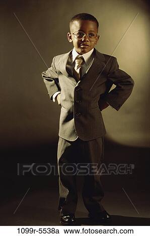 Stock Image - people, hands, suit, eyeglasses, boy, business, hips. Fotosearch