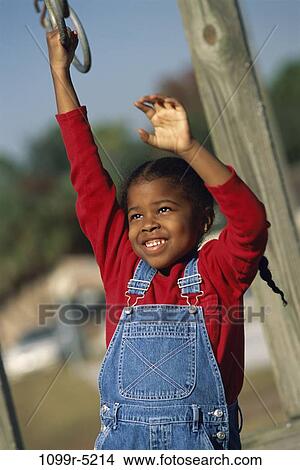 people, hanging, swinging, girl, swing, playground, outdoors View Large Photo Image Picture - people, hanging, swinging, girl, swing, playground, outdoors. Fotosearch