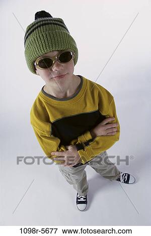 people, hat, sunglasses, boy, child, posing, indoors View Large Photo Image Stock Photo - people, hat, sunglasses, boy, child, posing, indoors. Fotosearch