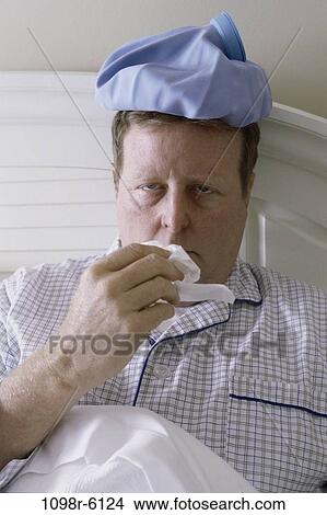 people, headache, nose, bed, cold, tissue View Large Photo Image Picture - people, headache, nose, bed, cold, tissue. Fotosearch