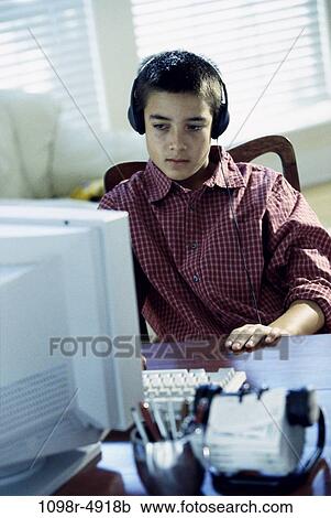 people, headset, male, listening, Hispanic, computer, game View Large Photo Image Stock Image - people, headset, male, listening, Hispanic, computer, game. Fotosearch
