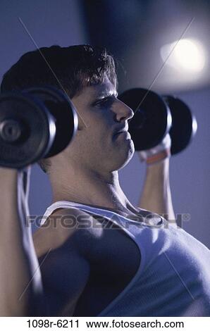 Stock Image - people, healthy, health, sports, exercise, lifting. Fotosearch