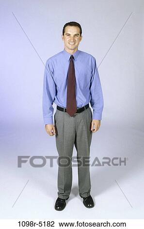 Stock Image - people, Hispanic, business, businessman, indoors, young adult. Fotosearch