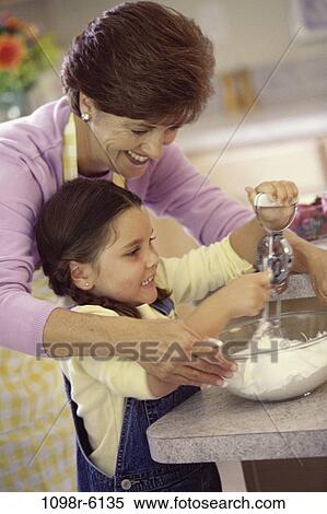 people, Hispanic, cooking, family, food, apron, kitchen View Large Photo Image Stock Photography - people, Hispanic, cooking, family, food, apron, kitchen. Fotosearch