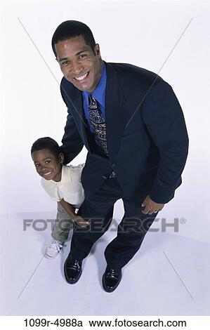 people, holding, leg, family, father, businessman View Large Photo Image Stock Image - people, holding, leg, family, father, businessman. Fotosearch