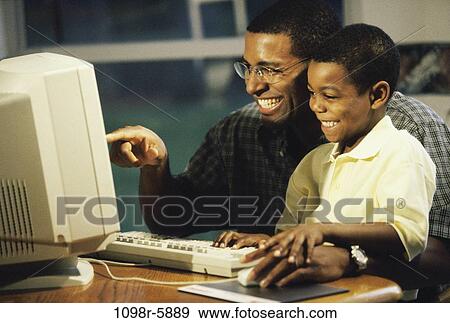 people, home, computer, joyous, family, using View Large Photo Image Stock Photo - people, home, computer, joyous, family, using. Fotosearch