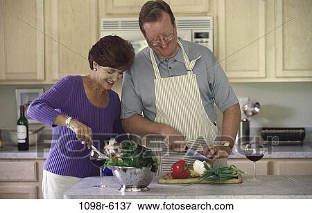 people, home, couple, wine, healthy, salad, cooking View Large Photo Image Stock Photo - people, home, couple, wine, healthy, salad, cooking. Fotosearch
