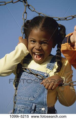 Stock Photography - people, laughing, girl, outdoors, child, screaming, scream. Fotosearch