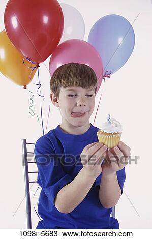 people, party, balloons, holding, boy, child, anticipation View Large Photo Image Stock Image - people, party, balloons, holding, boy, child, anticipation. Fotosearch
