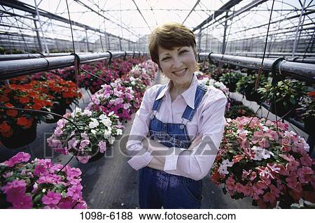people, plants, industry, woman, flowers, standing, agriculture View Large Photo Image Stock Photo - people, plants, industry, woman, flowers, standing, agriculture. Fotosearch