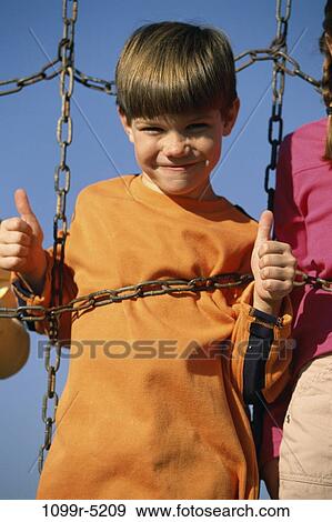 people, playing, boy, outdoors, achievement, child, play View Large Photo Image Stock Photo - people, playing, boy, outdoors, achievement, child, play. Fotosearch