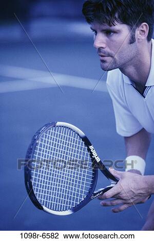 people, playing, concentration, tennis racket, tennis, outdoors View Large Photo Image Stock Image - people, playing, concentration, tennis racket, tennis, outdoors. Fotosearch