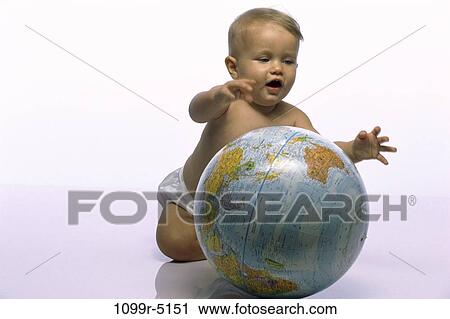 Stock Image - people, playing, globe, baby, blond, play, indoors. Fotosearch