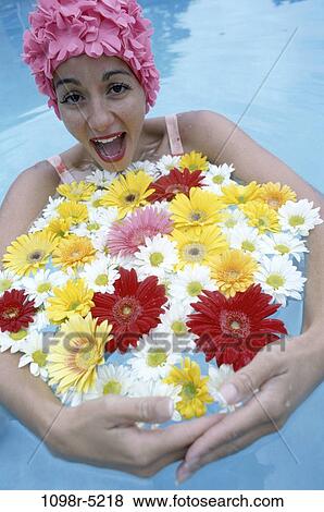 people, pool, woman, flowers, outdoors, joyous, Caucasian View Large Photo Image Stock Photo - people, pool, woman, flowers, outdoors, joyous, Caucasian. Fotosearch