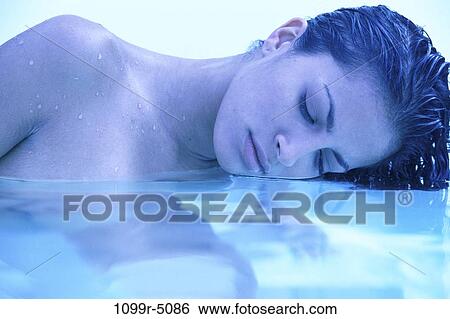Stock Photograph - people, pool, woman, Hispanic, outdoors, brunette, young adult. Fotosearch