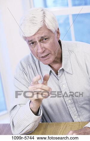 people, senior, confrontation, frustrated, serious, indoors View Large Photo Image Picture - people, senior, confrontation, frustrated, serious, indoors. Fotosearch