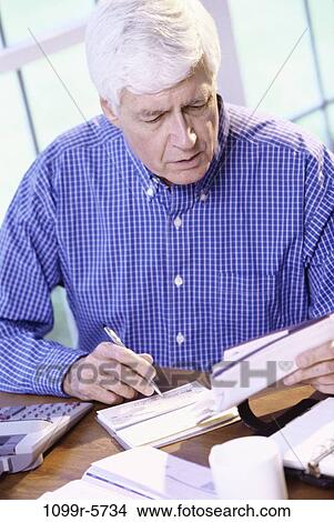 people, senior, writing, finance, bills, personal finance View Large Photo Image Picture - people, senior, writing, finance, bills, personal finance. Fotosearch