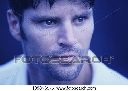 Stock Photography - people, serious, indoors, headshot, Caucasian. Fotosearch