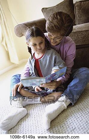 people, sitting, reading, floor, couch, family, brunette View Large Photo Image Stock Image - people, sitting, reading, floor, couch, family, brunette. Fotosearch