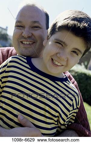 people, smiling, outdoors, hugging, smile, family View Large Photo Image Stock Photo - people, smiling, outdoors, hugging, smile, family. Fotosearch