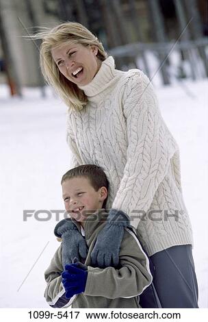 people, snow, mother, winter, outdoors, family View Large Photo Image Stock Photo - people, snow, mother, winter, outdoors, family. Fotosearch