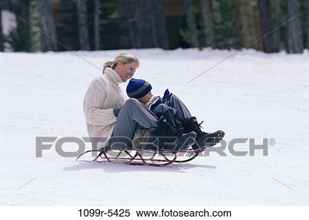 people, snow, mother, winter, outdoors, family View Large Photo Image Stock Photography - people, snow, mother, winter, outdoors, family. Fotosearch