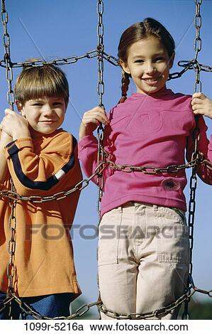 people, standing, outdoors, children, stand, brunette, Caucasian View Large Photo Image Stock Image - people, standing, outdoors, children, stand, brunette, Caucasian. Fotosearch