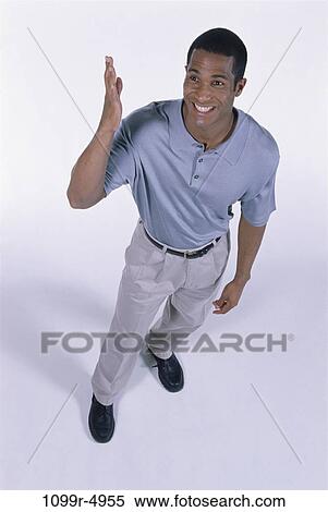 people, standing, stand, indoors, exclamation, African-American View Large Photo Image Stock Photography - people, standing, stand, indoors, exclamation, African-American. Fotosearch