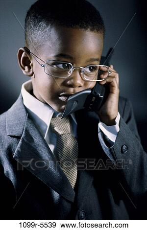people, suit, talking, eyeglasses, phone, boy, business View Large Photo Image Stock Photo - people, suit, talking, eyeglasses, phone, boy, business. Fotosearch