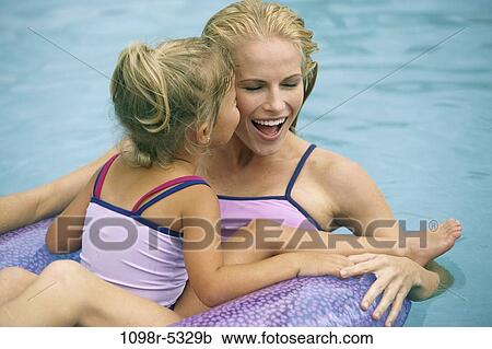 people, swim, floating, pool, mother, swimming, outdoors View Large Photo Image Stock Image - people, swim, floating, pool, mother, swimming, outdoors. Fotosearch