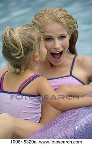 people, swim, floating, water, pool, playing, mother View Large Photo Image Stock Image - people, swim, floating, water, pool, playing, mother. Fotosearch
