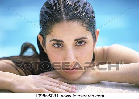 people, swim, pool, swimming, outdoors, brunette View Large Photo Image Stock Image - people, swim, pool, swimming, outdoors, brunette. Fotosearch