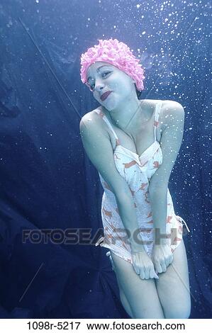 Stock Photo - people, swim, pool, woman, swimming, outdoors, Caucasian. Fotosearch