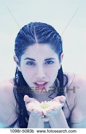 Stock Image - people, swim, water, pool, swimming, holding, flower. Fotosearch
